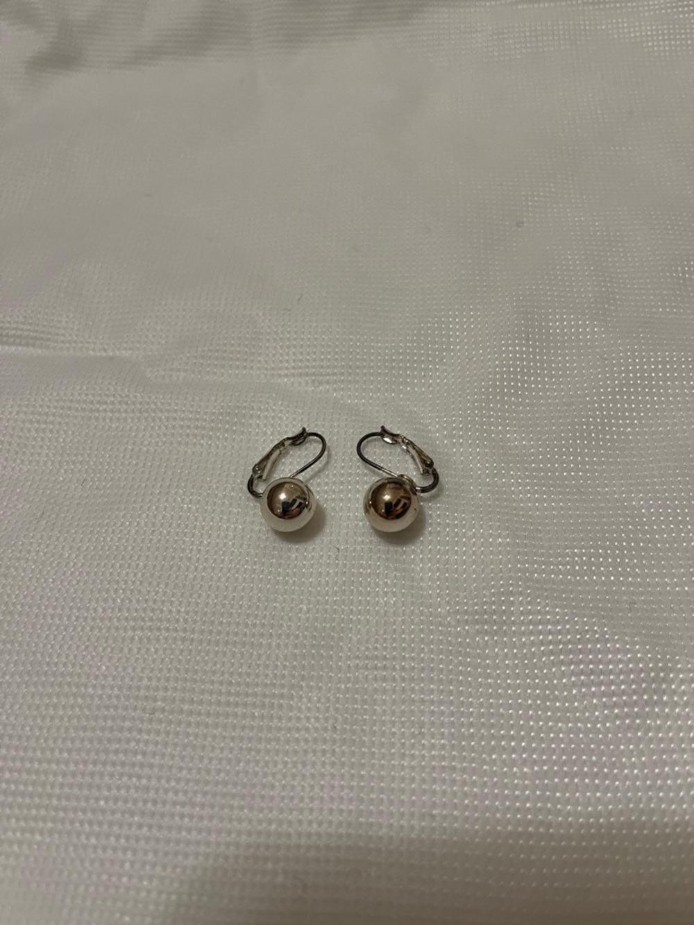 Silver earrings patina